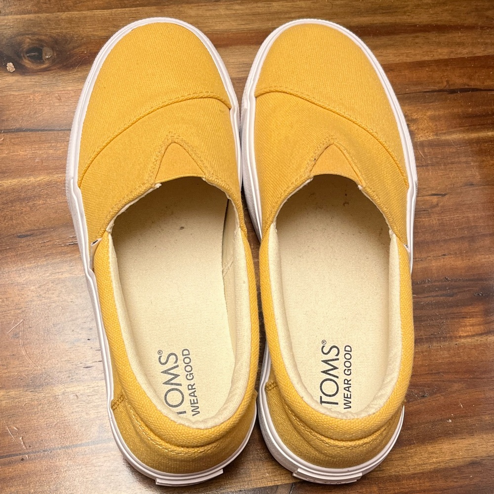 Toms yellow slip on sneakers